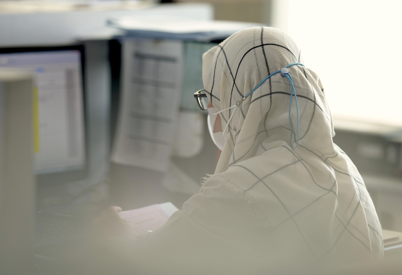 Woman, administrator, computer — Riverside Recovery: Transforming Lives in the Heart of New Jersey
